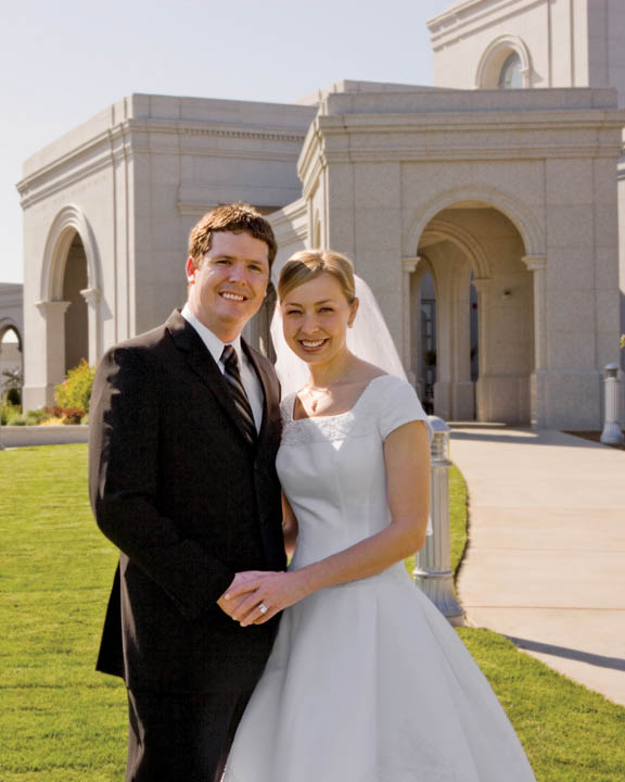 A photo of a Mormon couple outside of the temple after being married.