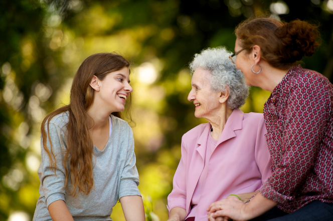 Woman laughing with her grandmother.