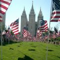 The Salt Lake City Temple is decorated with flags.
